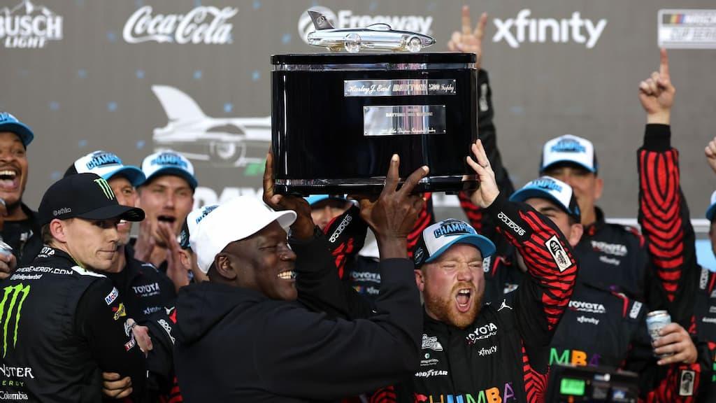 NASCAR Betting Guide cover (Tyler Reddick and Michael Jordan celebrating Reddick's 2026 Daytona 500 win)