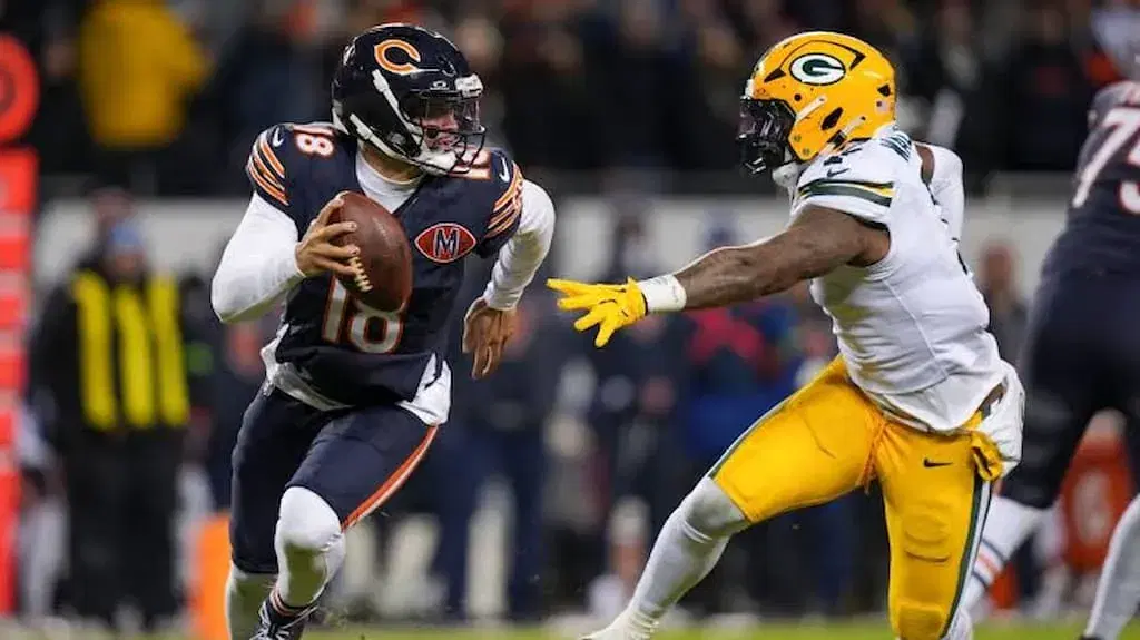 Caleb Williams will have his hands full against the Patriots defense this Thursday - Patriots Bears NFL Expert Picks